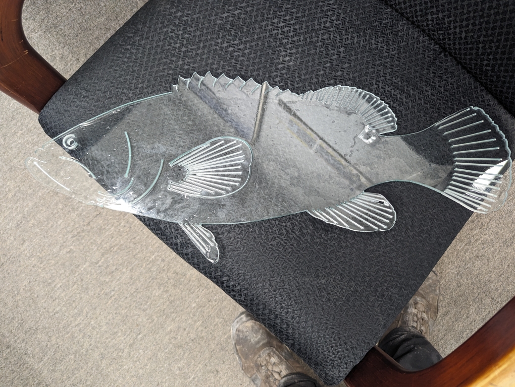 Glass artwork of a fish.