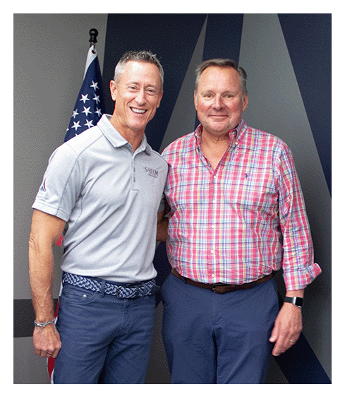 Two men posing for a picture